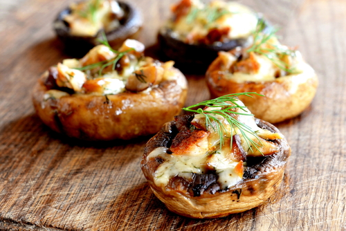 Brown mushrooms filled with cheese and herbs