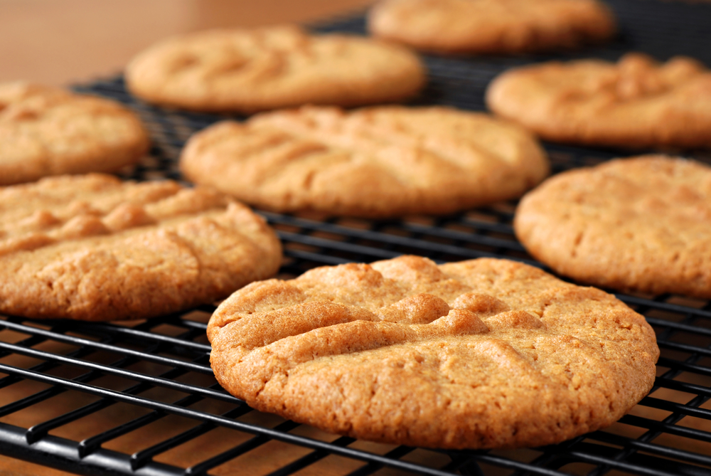 Golden gluten-free shortbread biscuits cooling on a wire rack